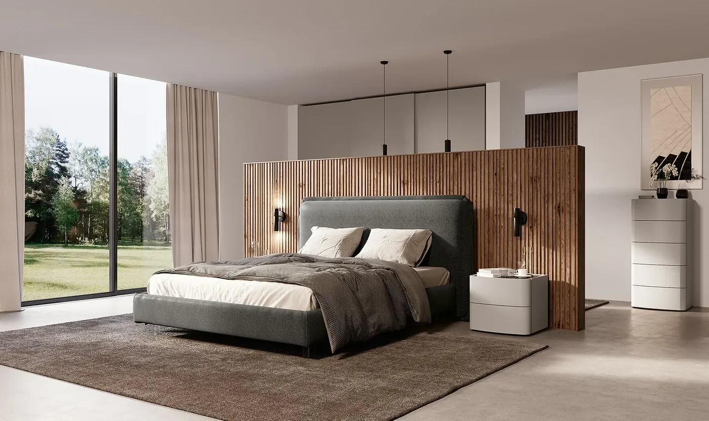 A bedroom with an upholstered bed and a timber wall